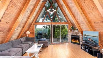 Älytelevisio, takka, pöytäjalkapallopöytä