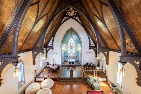 Interior. Enjoy vacationing in a gorgeous renovated 1890's Church in beautiful Aurora!