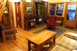 Fireplace, books - Basswood at Cotton Lake--A Wonderful Vacation Destination (Rochert)
