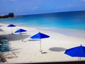 On the beach, sun loungers, beach towels