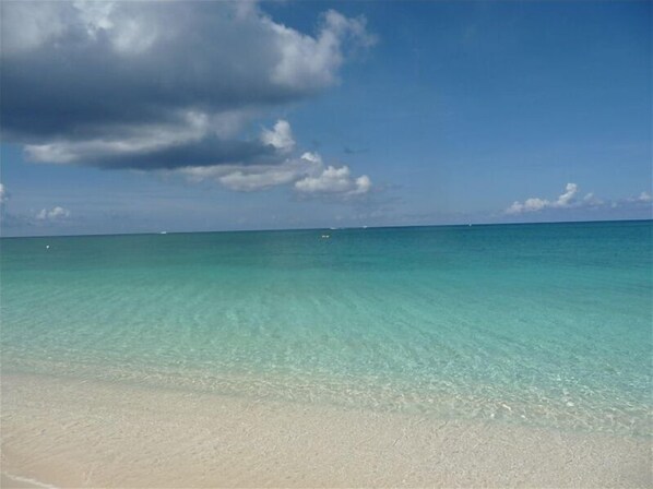 On the beach, sun loungers, beach towels