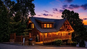 A log cabin with a porch, a mailbox, and a stone wall. - A+ Views & Location! Minutes 2 Dollywood. Hot Tub Games Pet Friendly Resort Pool (Pigeon Forge)