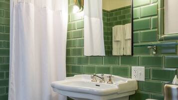 Combined shower/bathtub, hair dryer, towels, soap