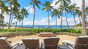 On the beach, sun loungers, beach towels