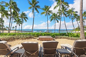 On the beach, sun-loungers, beach towels