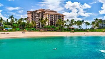 On the beach, sun-loungers, beach towels