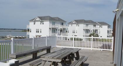 Come for the beach, stay for the memories. Enjoy free beach access & huge pool!