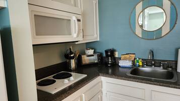 Fridge, microwave, coffee/tea maker, toaster