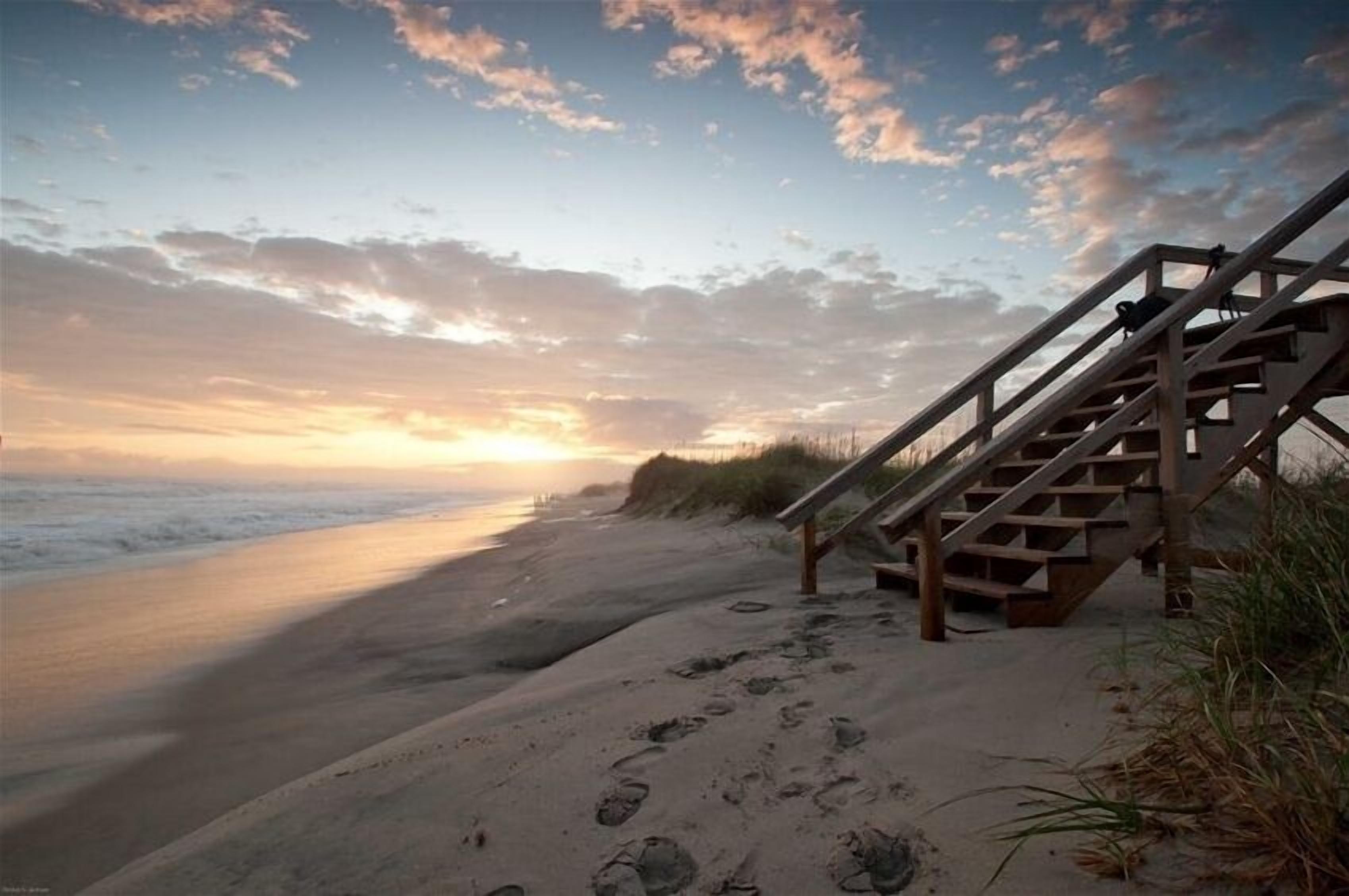 On the beach, sun loungers