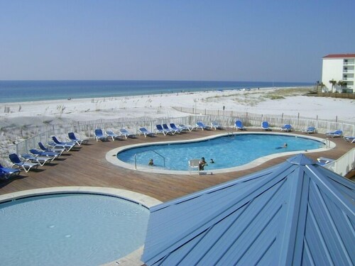 Beach Bliss !  Comfortable and Affordable Only Steps From Sugar White Sand Beach