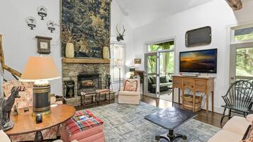 Smart TV, fireplace, table tennis, books