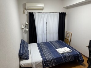 1 غرفة نوم ومكواة/لوح كي وواي فاي وملاءات أسرّة