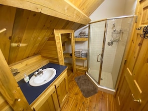 Combined shower/tub, hair dryer, towels, soap