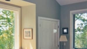 A bedroom with a bed, a desk, a chair, a window, and a ceiling fan. - Mountainview House - Luxurious Privacy Above the Clouds (Aquone)