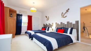 8 bedrooms, desk, iron/ironing board, travel crib