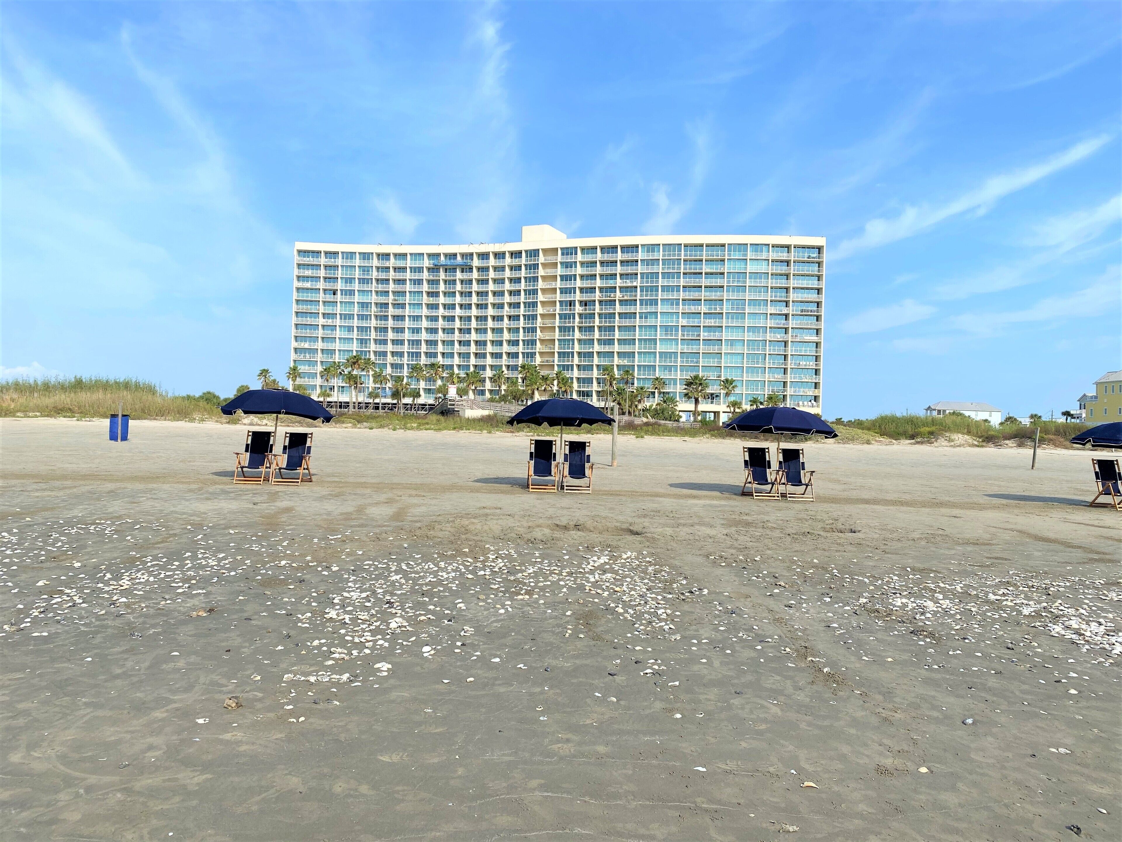 On the beach, sun loungers, beach towels