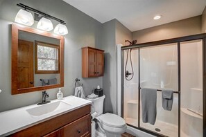 Combined shower/tub, hair dryer, towels, soap