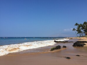 On the beach, sun-loungers, beach towels