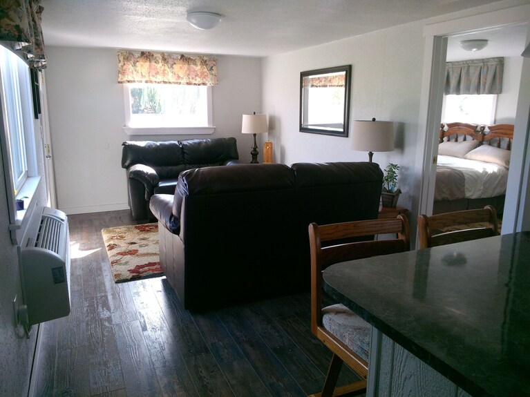 Tranquil Setting Surrounded By Panoramic Mountain Views, Grazing Horses - Oregon