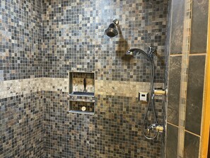 Combined shower/tub, hair dryer, towels, soap