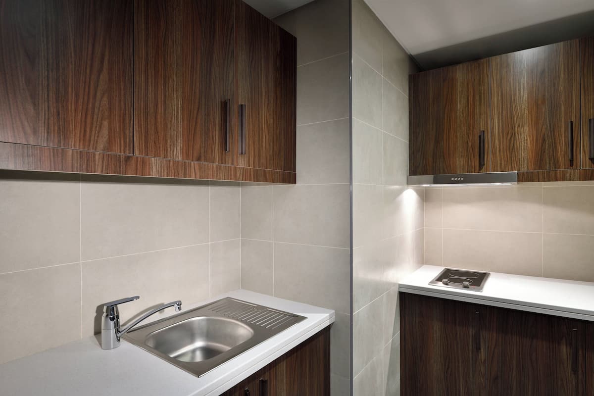 club suite, 1 bedroom, smoking | private kitchen | coffee/tea maker, cookware/dishes/utensils