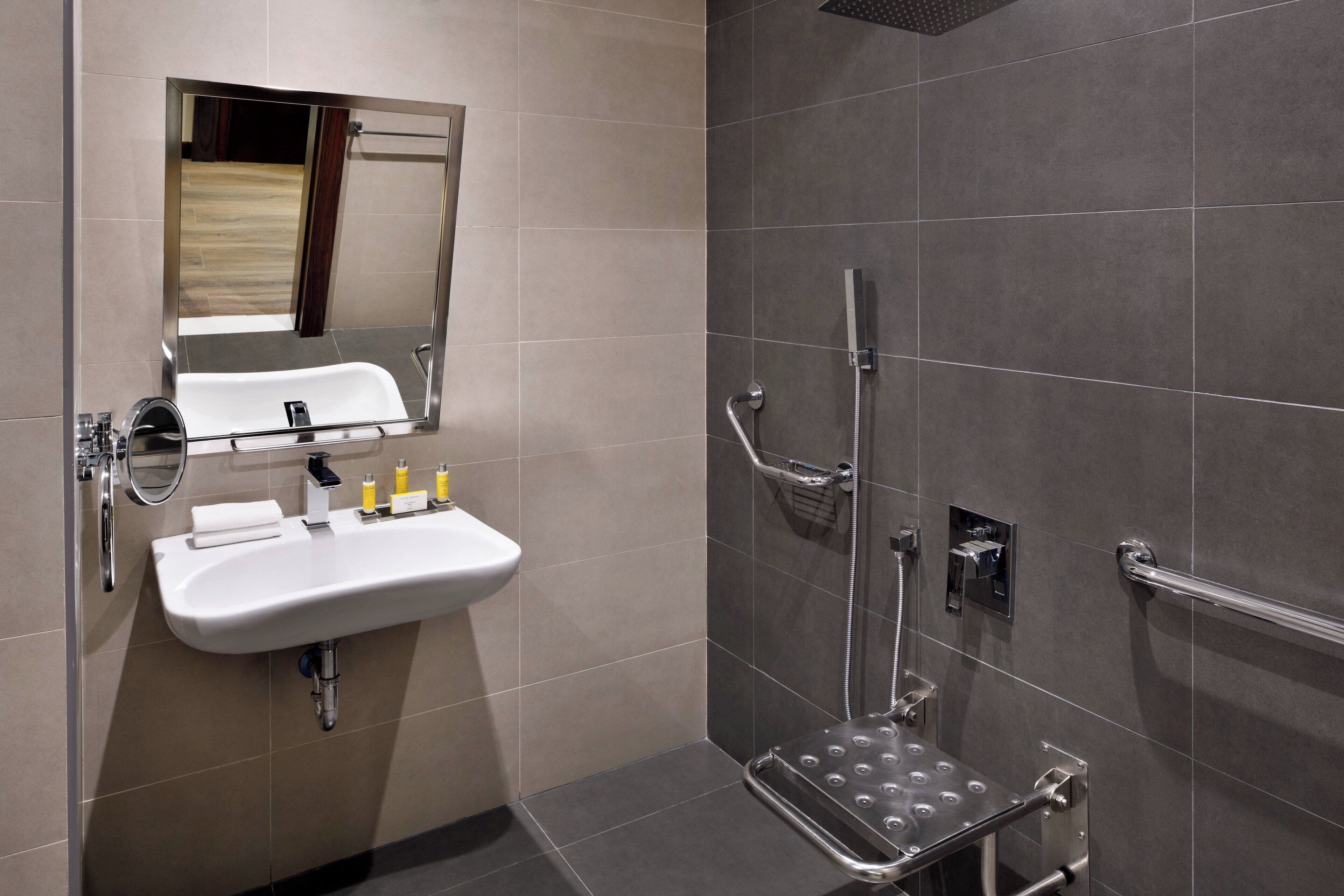 deluxe room, 1 king bed | bathroom | free toiletries, hair dryer, bathrobes, slippers