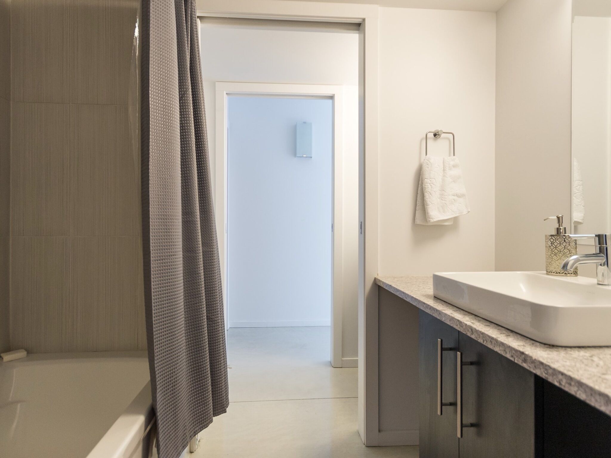 Combined shower/tub, hair dryer, towels, soap