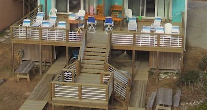 DIRECT OCEANFRONT Duplex with large deck next to Oceanana Fishing Pier.