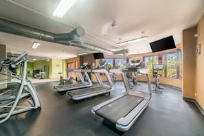 A gym with treadmills, exercise bikes, and a rowing machine. - Bella Sirena Condo-BEST VIEWS! • Tower A! • (Puerto Penasco)
