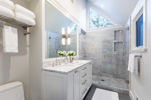 Combined shower/tub, hair dryer, towels, soap
