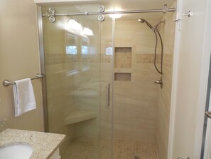 Combined shower/tub, hair dryer, towels, soap