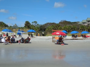 Beautiful beach--easy parking or take shuttle from condo. Owners provide pass  