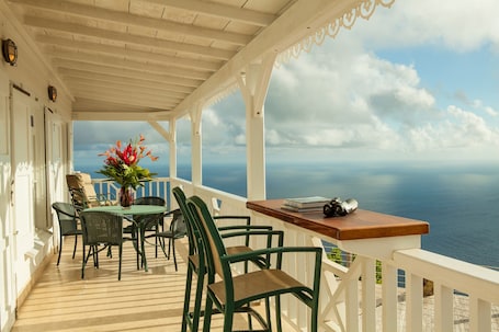 Outdoor dining. Spyglass is a Private Villa With 360 View Near Windwardside.