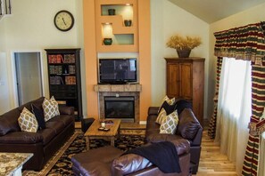 TV, fireplace, books, offices