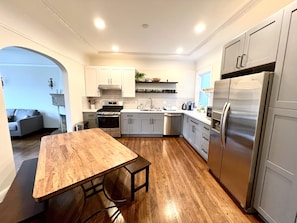 Electric kettle, paper towels, dining tables