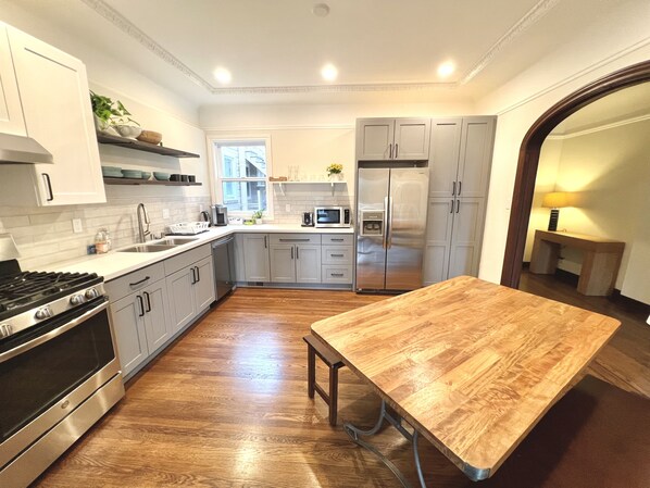 Electric kettle, paper towels, dining tables