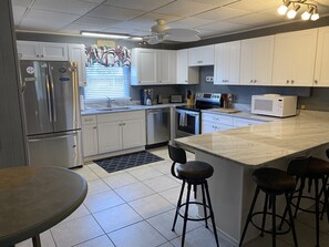 Fridge, microwave, oven, stovetop - Ocean Views! 75' from Gulf Of Mexico! Large deck for Family Relaxing (St. George Island)