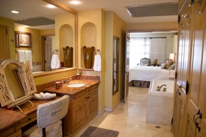 Shower, jetted bath, hair dryer, towels