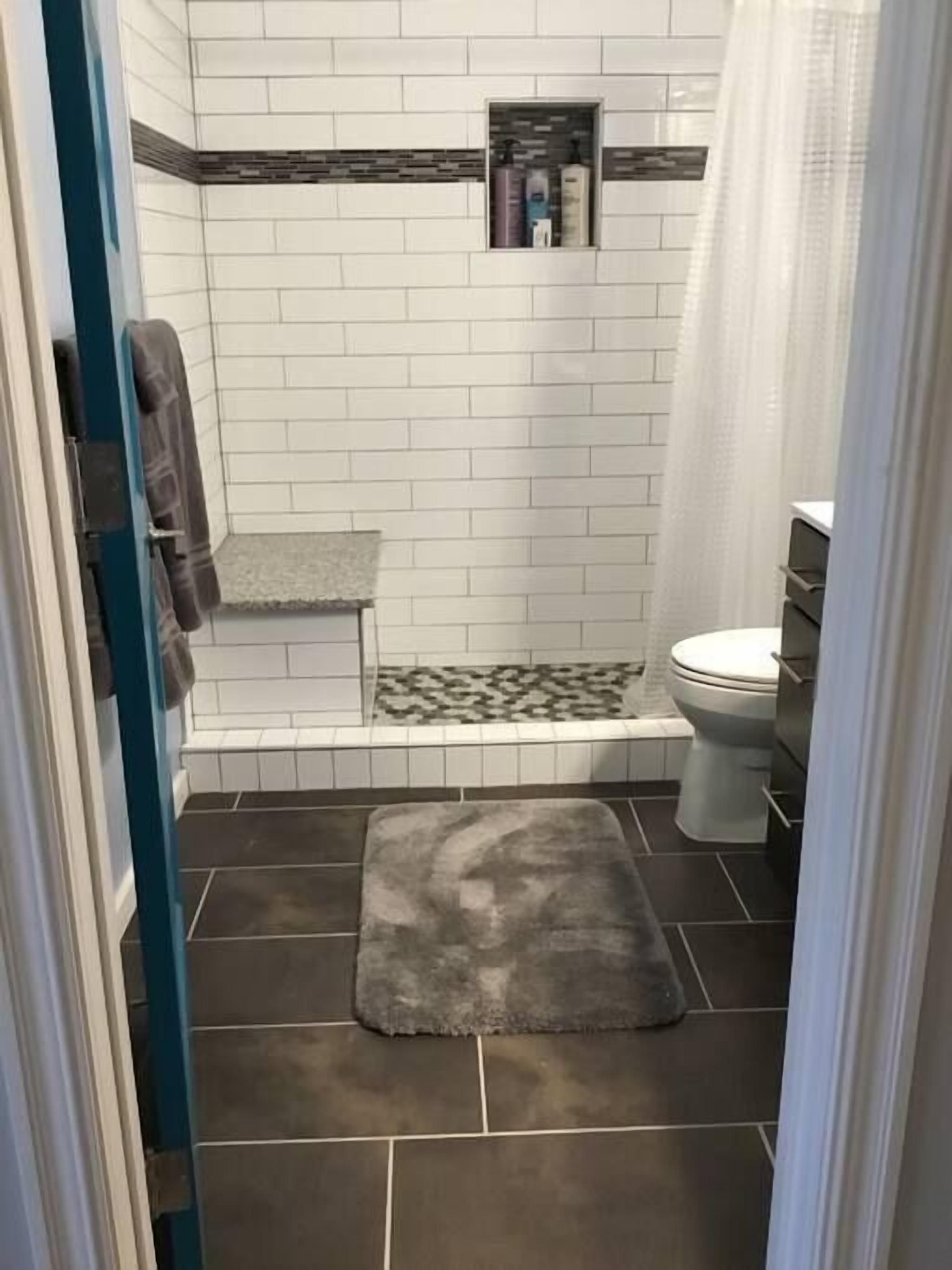 Shower, hair dryer, towels, shampoo