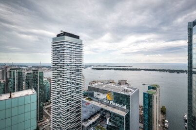50th+ floor lake view condo beside CN tower