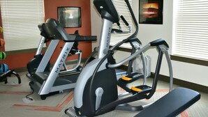 A gym with stationary bikes and an elliptical machine. - Yellowstone Rustic Luxury Condo Sleeps 11 in an Award Winning Resort (Island Park)