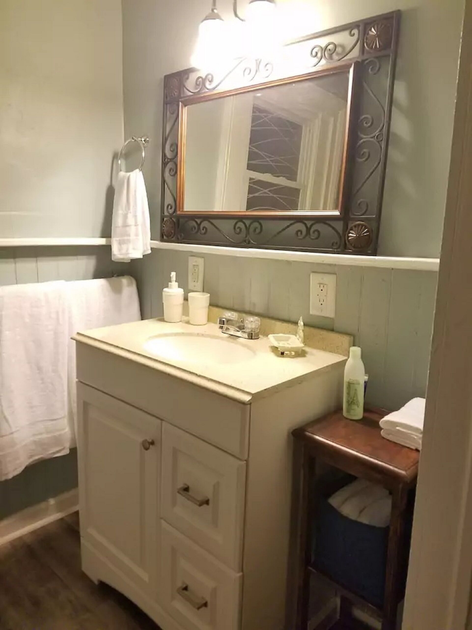 Bathtub, hair dryer, towels, soap