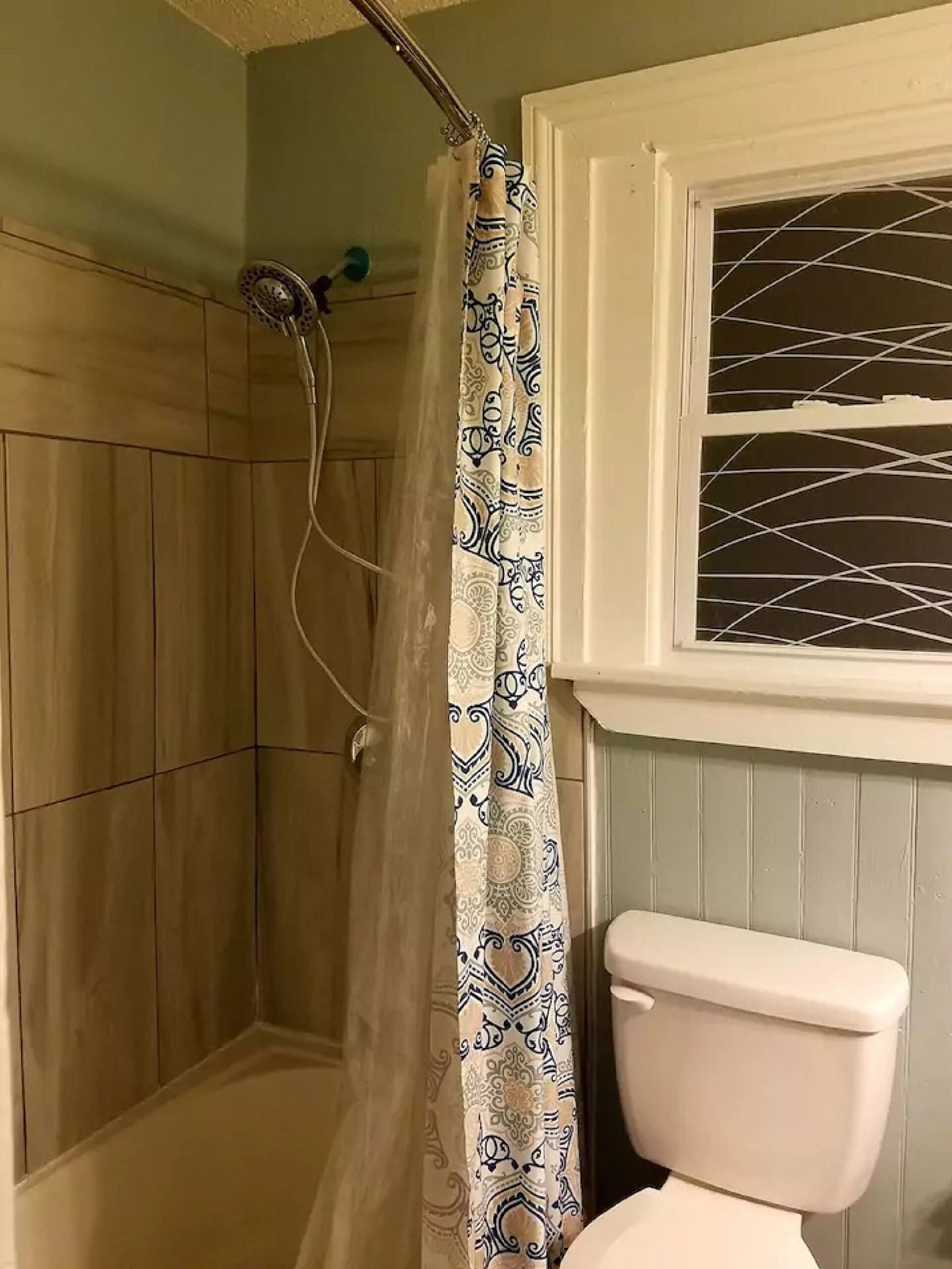 Bathtub, hair dryer, towels, soap
