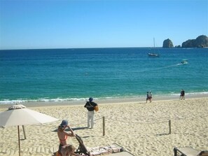 On the beach, sun-loungers, beach towels