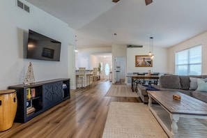 Flat-screen TV, fireplace, DVD player, stereo