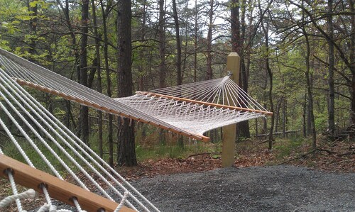 Private getaway w/ hot tub, wifi. Secluded amongst trees & near Sleepy Creek. 