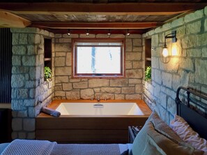 Jetted bath, eco-friendly toiletries, hair dryer, towels