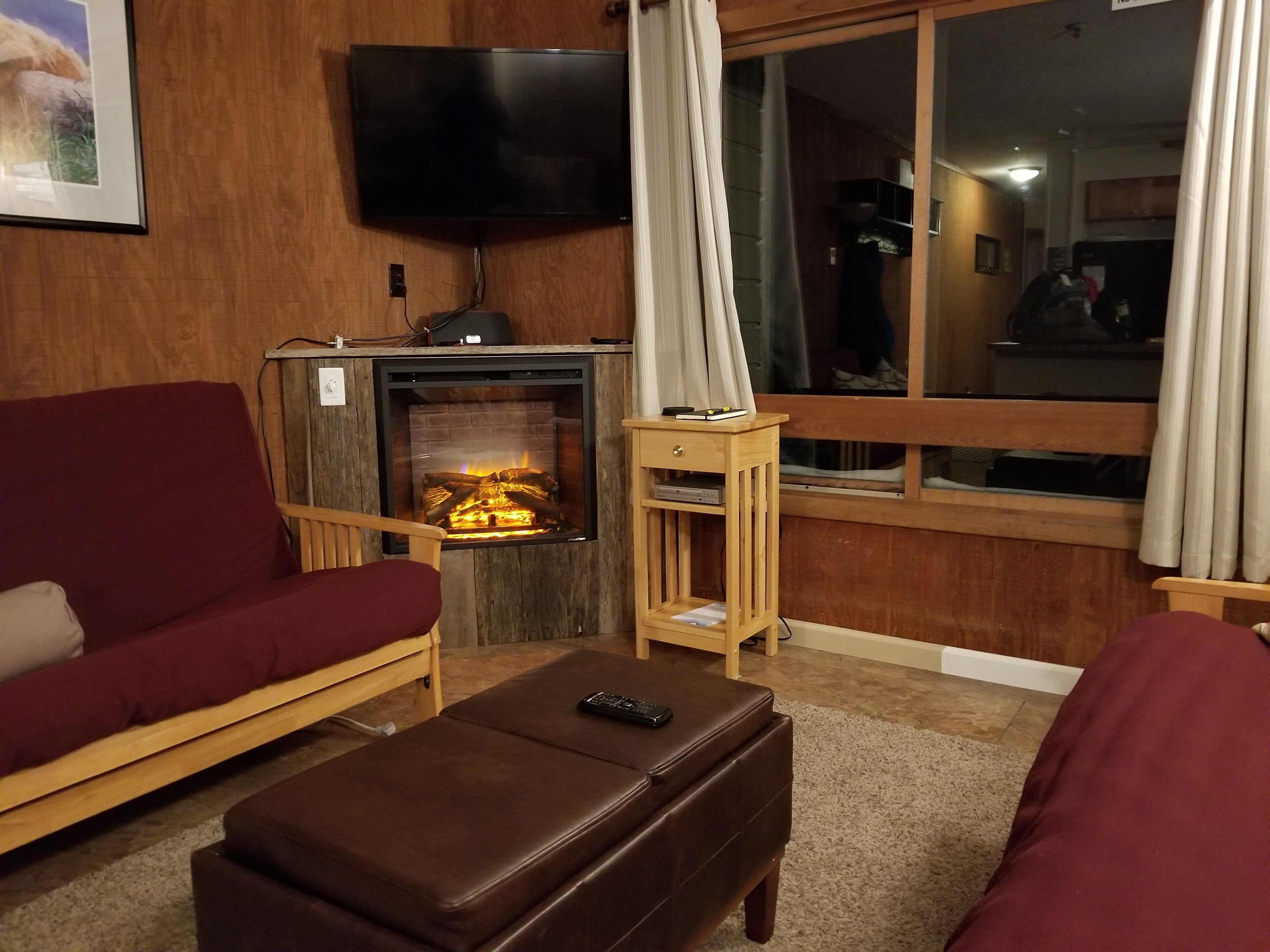 Flat-screen TV, fireplace, DVD player, stereo