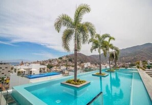 A heated pool - BRAND NEW, LUX ONE BEDROOM IN OLD TOWN, 3 BLOCKS FROM THE OCEAN, OLD TOWN (Puerto Vallarta)