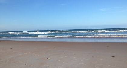 No snow here. 5 minute walk to the beach. Quiet neighborhood.